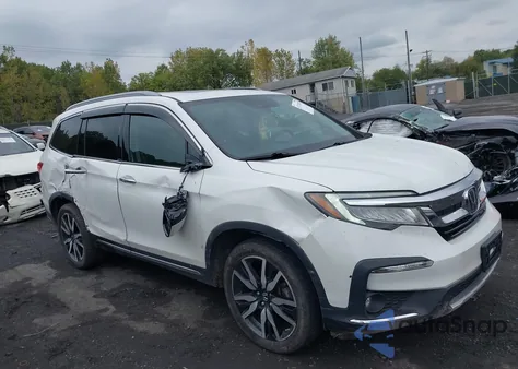 2021 Honda Pilot Awd Touring 7 Passenger z USA, uszkodzony, nr VIN 5FNYF6H68MB024972